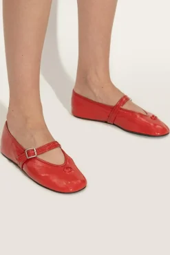Coach RED Ballet flats with a logo-shaped appliqué.