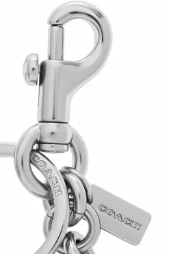 Coach SILVER Keychain with a pendant in the shape of a logo