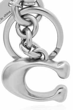 Coach SILVER Keychain with a pendant in the shape of a logo