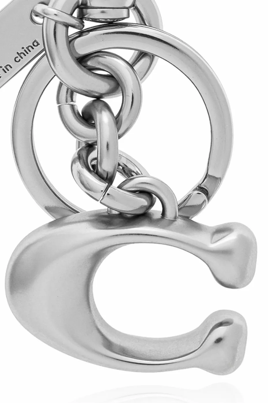 Coach SILVER Keychain with a pendant in the shape of a logo