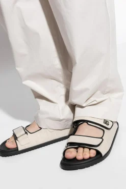 Dolce & Gabbana cream Slides with a logo-shaped appliqué