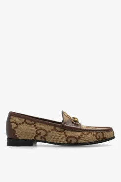 Gucci beige Monogrammed loafers