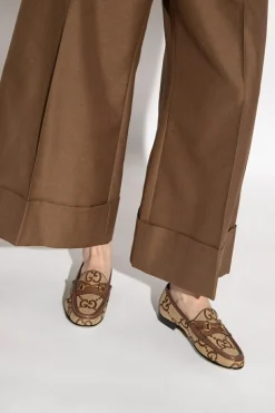 Gucci beige Monogrammed loafers