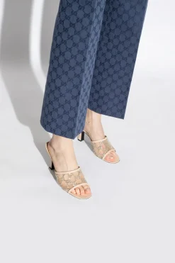 Gucci beige Monogrammed mules
