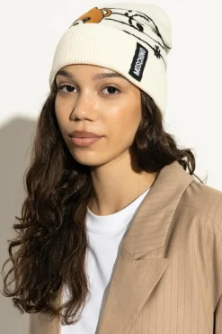 Moschino cream Cap with a distinctive bear motif