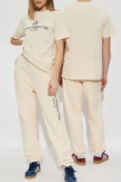 Sporty & Rich cream Sweatpants from the Preppy collection