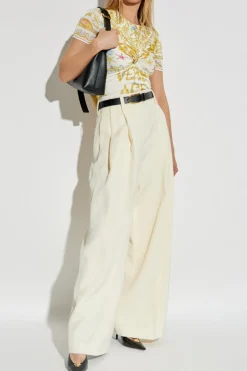 Versace cream Top with decorative draping and a brooch